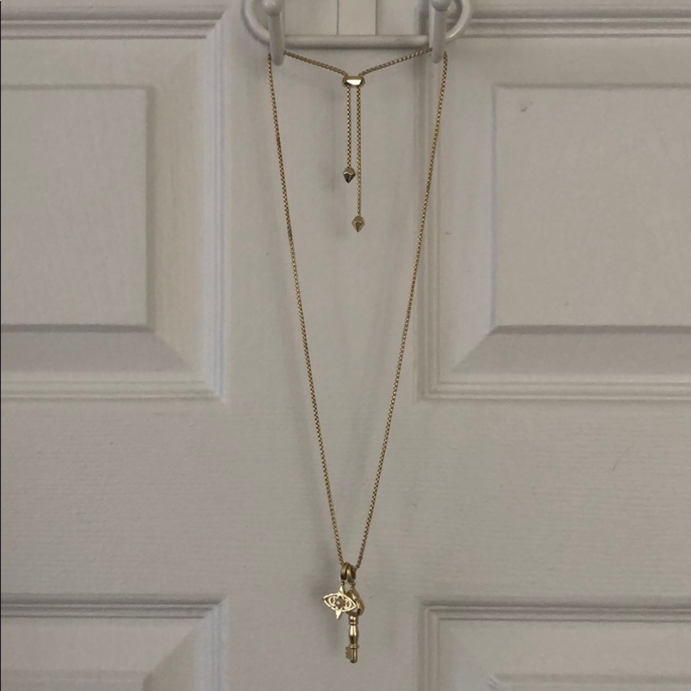 Kendra Scott gold charm necklace